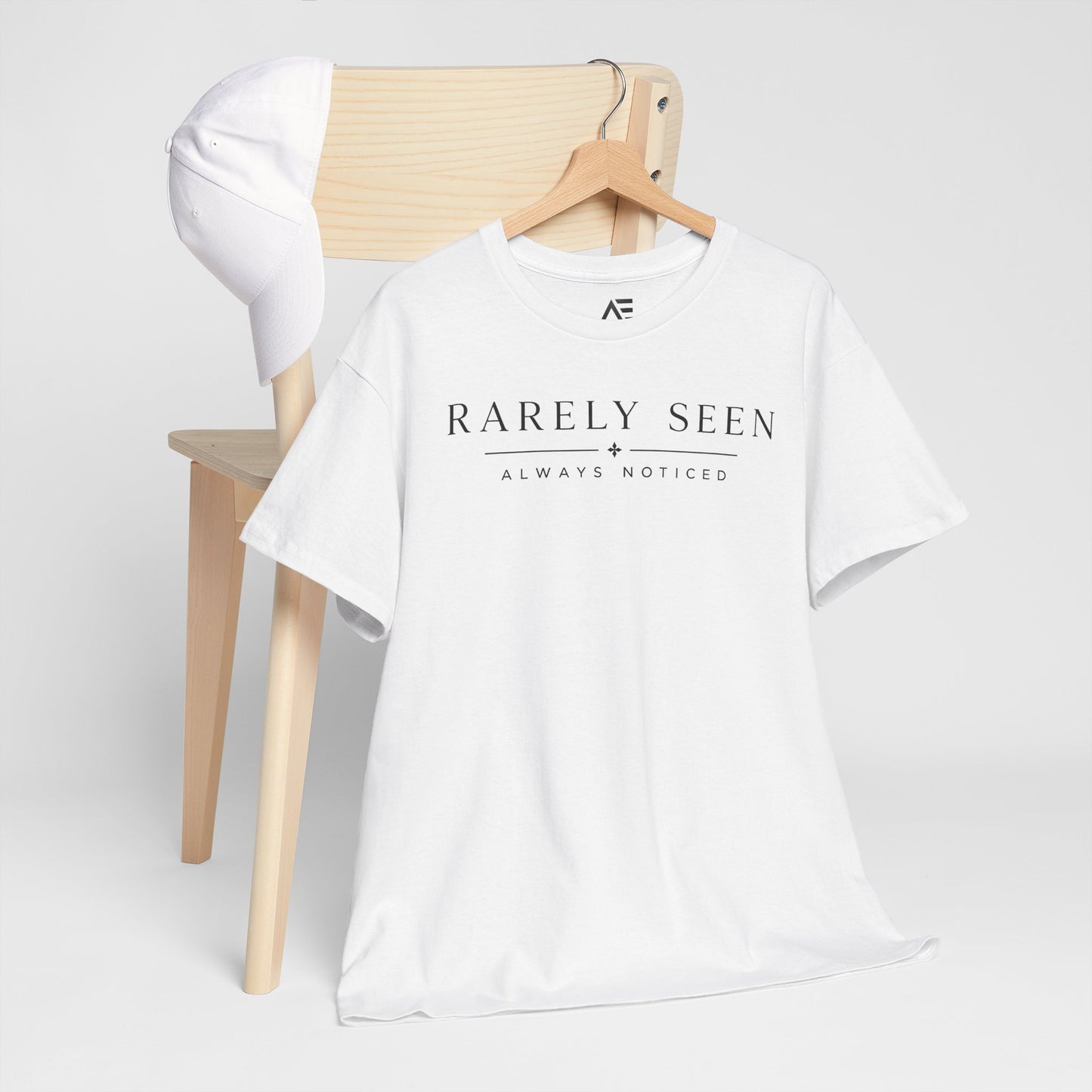 Rarely Seen Tee – Minimalist 'Rarely Seen, Always Noticed' White Cotton T-Shirt
